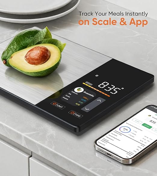 Digital nutrition scale displaying avocado calorie values on its built-in display and mobile screen