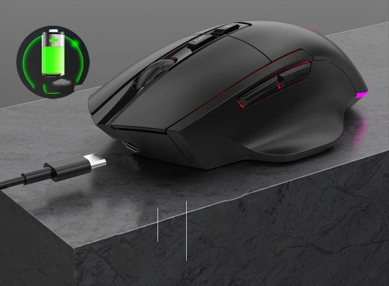 Black gaming mouse with USB cable on a gray surface